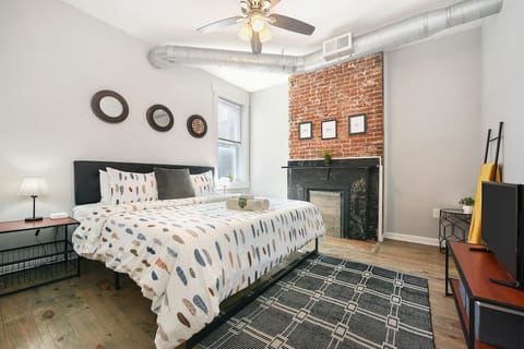 Unwind in the spacious master bedroom with a king-size bed.