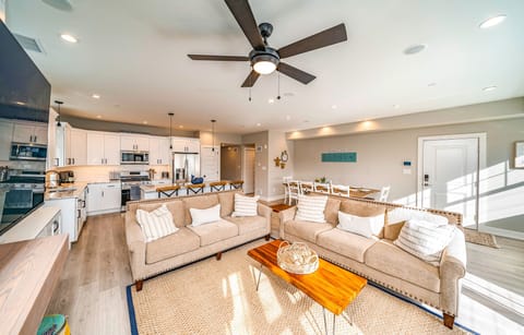 Comfortable and new! Open concept living and dining room with 65 inch ROKU HDTV!