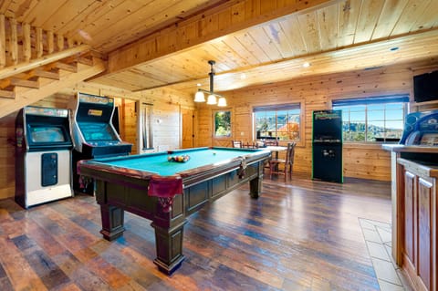 Hang out in the large game room with pool, Golden Tee, video games & juke box.