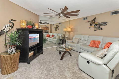 Buttery-soft leather sectional sofa with electronic recliners at each end