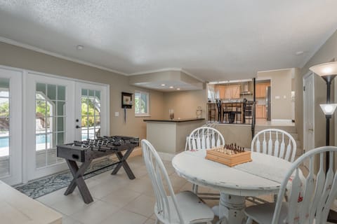 Foosball table and game table for a variety of fun options