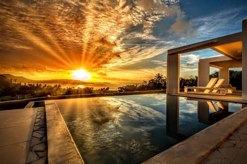 Beautiful sunset from the pool of the villa
