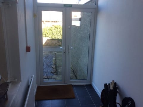 Utility room - access to car park at rear