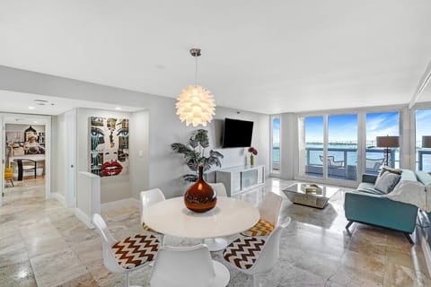 Dining area for 4, living room, Roku tv, Balcony access