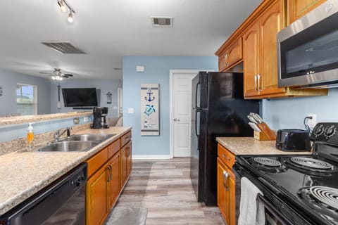 Fully stocked kitchen with utensils, plates, child friendly plates/cups, etc.