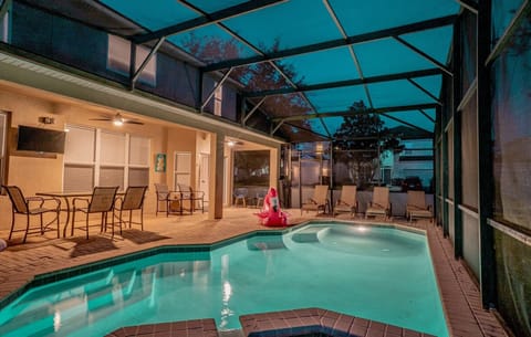Beautiful pool deck with pool, spa, dining area and loungers