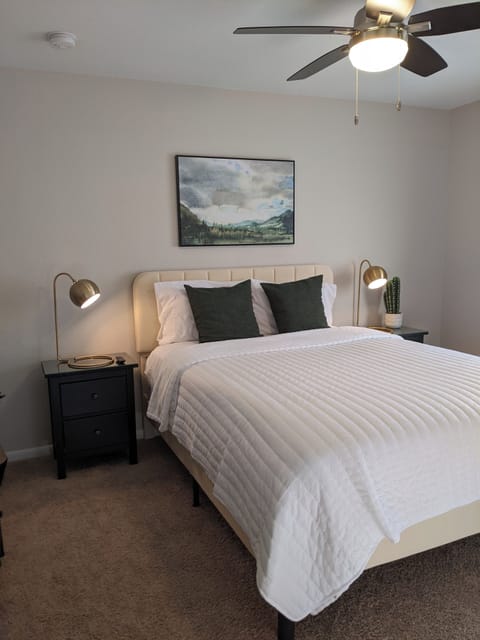 South upstairs bedroom with queen sized bed and 32" Smart TV