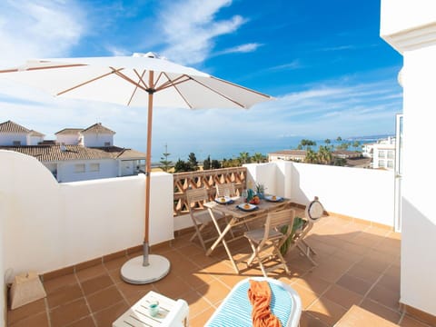 Cloud, Sky, Property, Furniture, Building, Azure, Shade, Seaside Resort, Outdoor Furniture, Wood