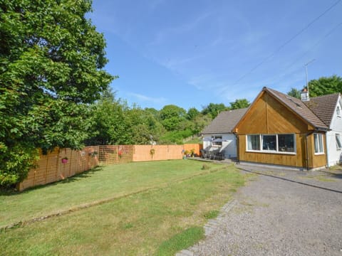 Plant, Sky, Building, Tree, Land Lot, Natural Landscape, Wood, Cloud, Window, House