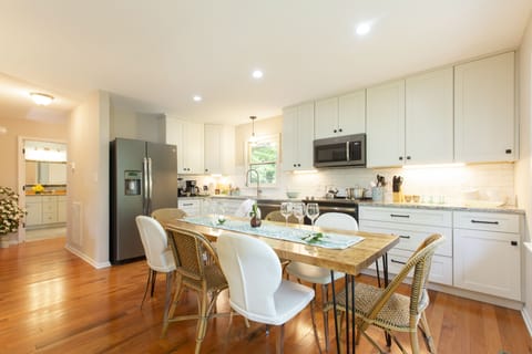 Beautiful wood dining table w/ seating for 8