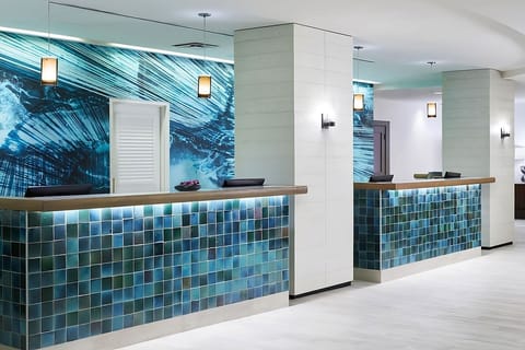Arrive smoothly with attentive service at the modern front desk.