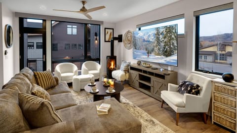 Great room with fireplace and TV