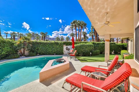 View from kitchen and master bedroom of pool, putting green and mountains.
