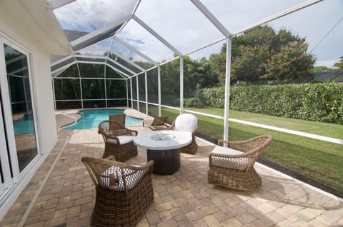 patio with fire table and Weber grill

