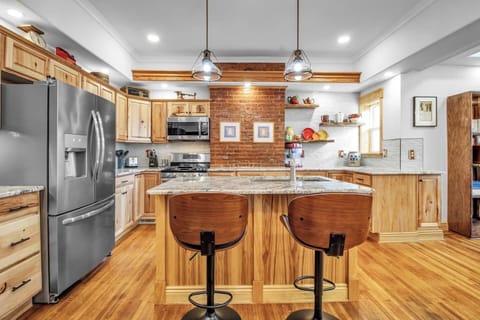 Experience the joy of cooking in our well-appointed Airbnb kitchen, designed for both convenience and inspiration!