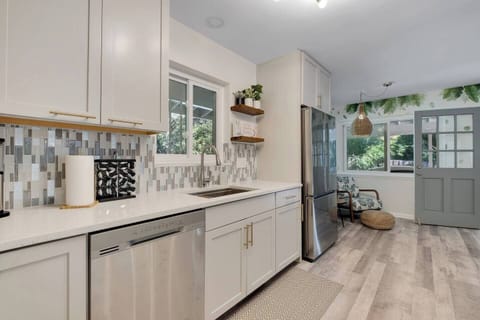 It's a lovely kitchen with quartz tops, stainless appliances and fully stocked for use during your stay.