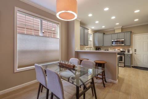 Dining &Kitchen. Dining table for 6 w/ bench from entry, 2 at counter, 8 total.