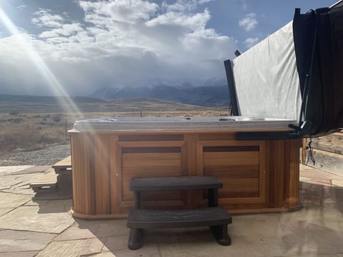 Enjoy the hot tub while taking in the view