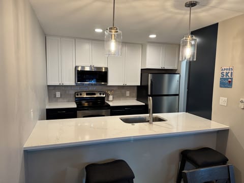 Brand new kitchen with bar seating