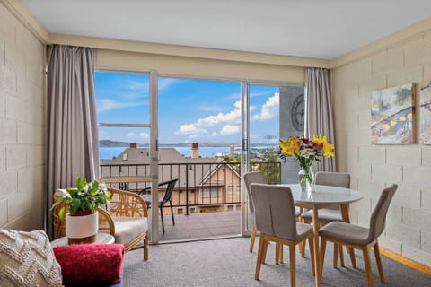 Enjoy meals in the dining area, which features a four-seater table for family gatherings.
