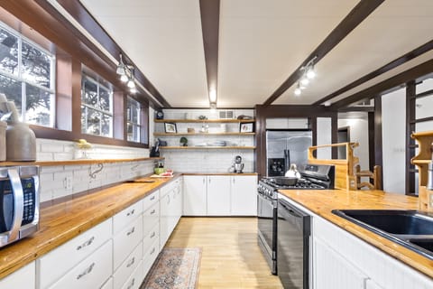Fully Stocked Kitchen with Kitchen Aid, Vitamix along with basic needs and more.