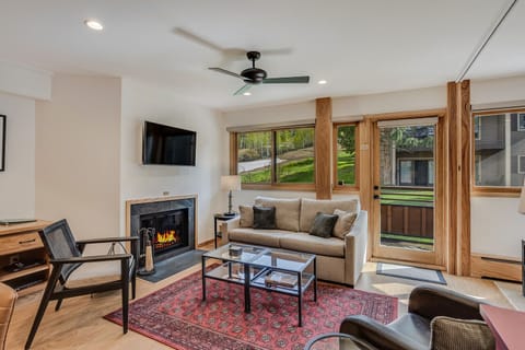 Living room with wood-burning fireplace