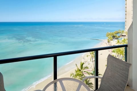 Sip morning coffee as the shoreline stretches beneath you.