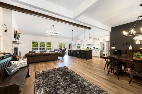 Create lasting memories gathered around the dining room table, or in the open living area on the main level, perfect for cherished traditional family meals or lively games.