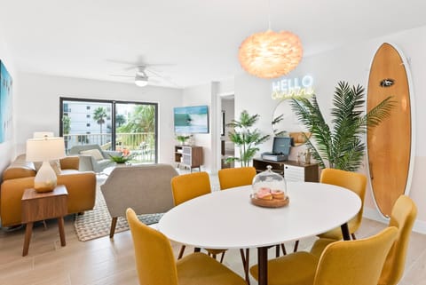 Bright and inviting dining area with stylish decor and seamless indoor-outdoor flow.