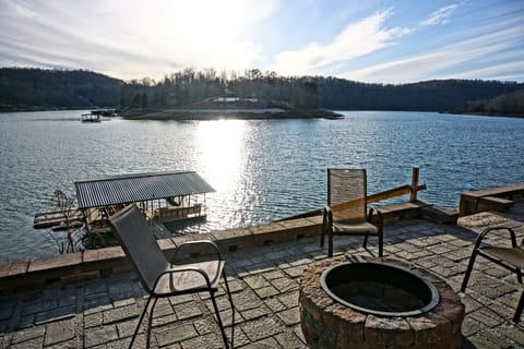 Paver Patio with Firepit. Overlooking Boathouse and main channel.