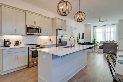 Well equipped kitchen with an island counter