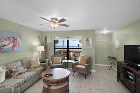 Comfortable living room with plenty of seating, Queen sleeper sofa, 55" Smart TV, beachy decor, and Gulf views!