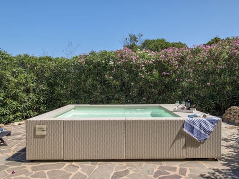 Water, Sky, Swimming Pool, Flower, Building, Rectangle, Azure, Plant, Outdoor Furniture, Table