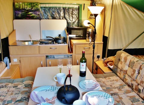 2 sofas, large table and kitchen taken from door