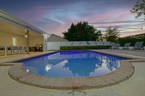 Pool area totally fenced, canal view
