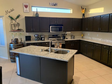 Remodeled kitchen with granite counter top and new fixtures.
