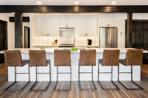 Kitchen with oversized island with seating for 6