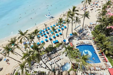 Dive into the pool, then stroll straight onto the beach.