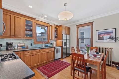 Another view of the updated kitchen highlighting its inviting design.