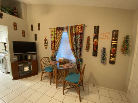 Your dining area, between the entertainment center and selfie wall.