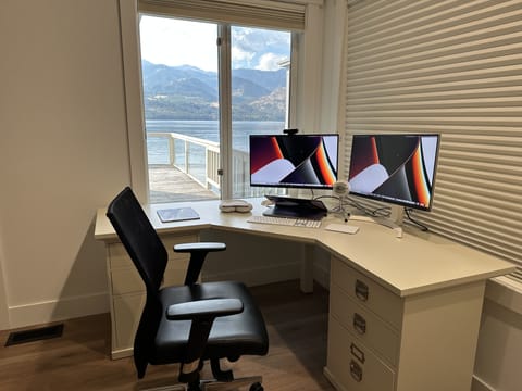 Private working space with an amazing view. Located in main bedroom.