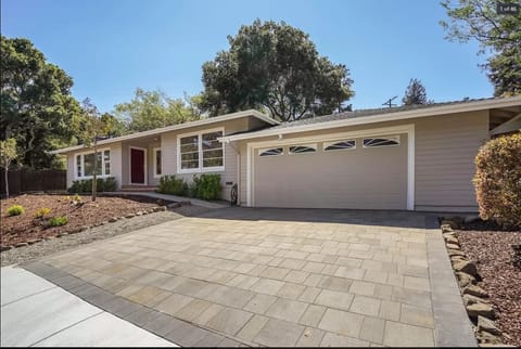 Garage and Driveway should accommodate four vehicles.