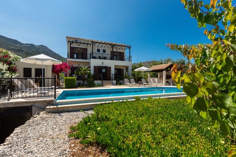 Outdoors
The villa and the pool