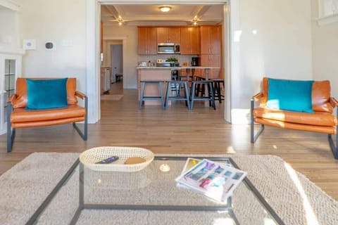 The living room flows into the dining room and kitchen