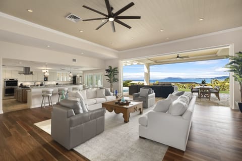 Gather with loved ones in the open-concept living space with soaring ceilings.