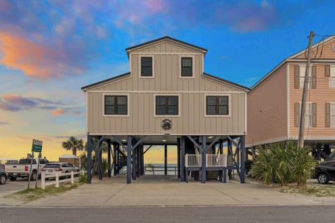Framed by a painted sky, Memories in the Sand stands oceanfront and elevated—offering breezy mornings, glowing sunsets, and a front-row seat to the rhythm of the tide.