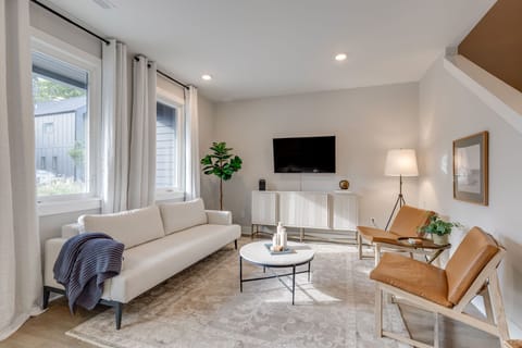 Spacious living room with plenty of seating and Smart TV