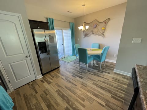 WORK? ONLY IF YOU HAVE TO! Table is great place for laptops to start that book! 