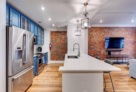 long kitchen bar with additional seating 