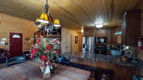 Large open kitchen located adjacent to the dining area.